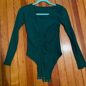 Light green body suit